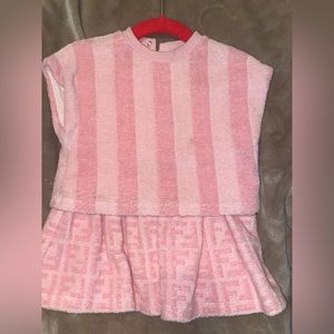 9 months fendi dress . Minor stains throughout that can be cleaned. Worn once